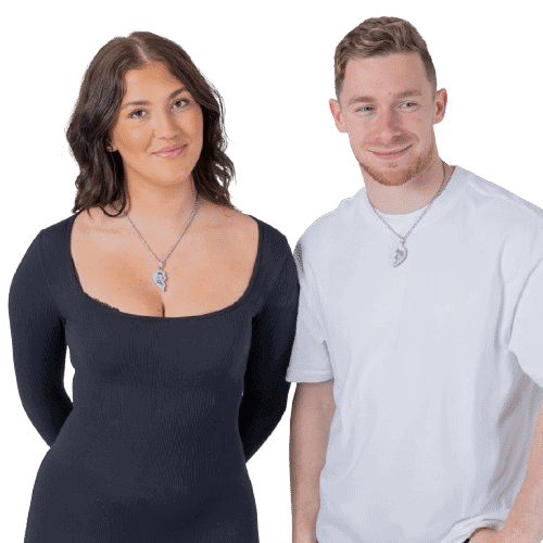 Man and woman wearing one half of a broken heart silver chain.